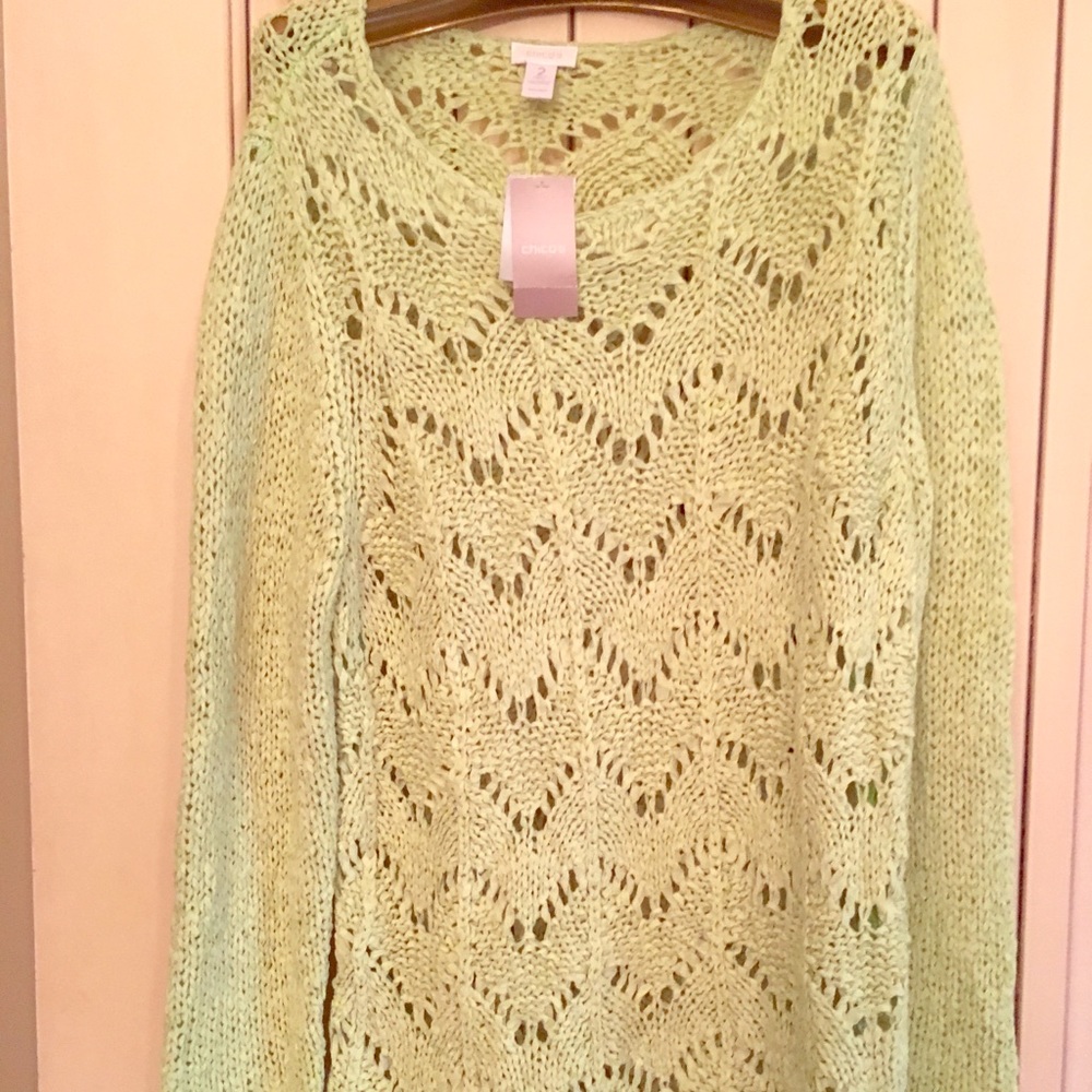 Brand new Chico’s sweater size 2 (M/L) equivalent.